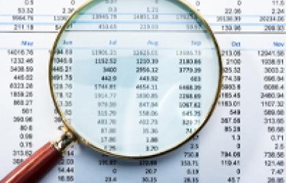 Image of numbers and magnifying glass